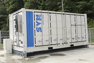 This is a photograph of NAS batteries. They use their characteristic large capacities to stabilize the grid by charging and discharging to absorb the fluctuations in power output from wind and solar power.